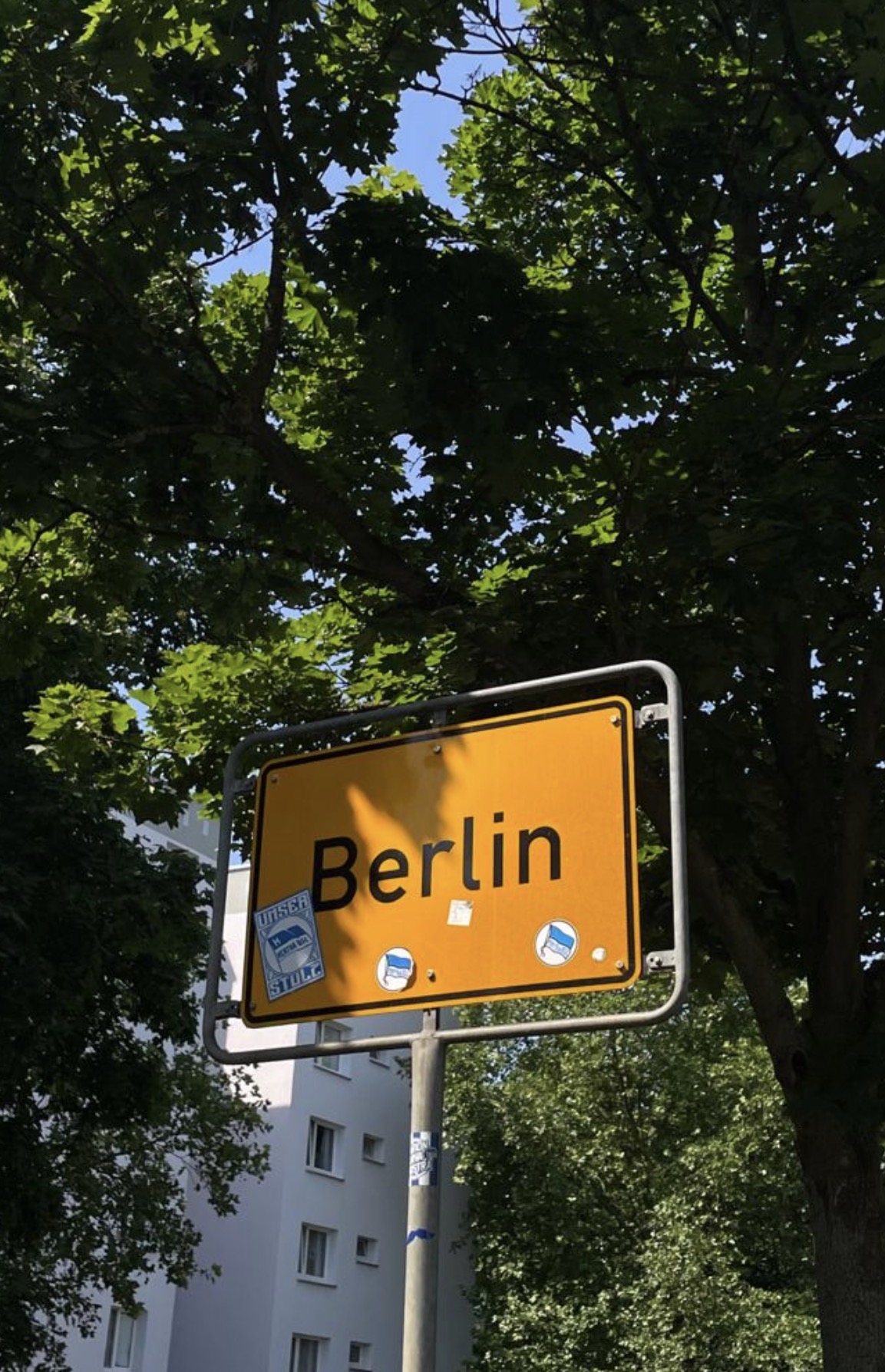 The yellow Berlin city limits sign